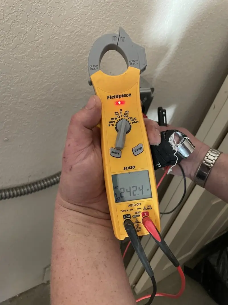 Voltage testing with clamp meter during Circuit Breaker Repair in Elizabethtown
